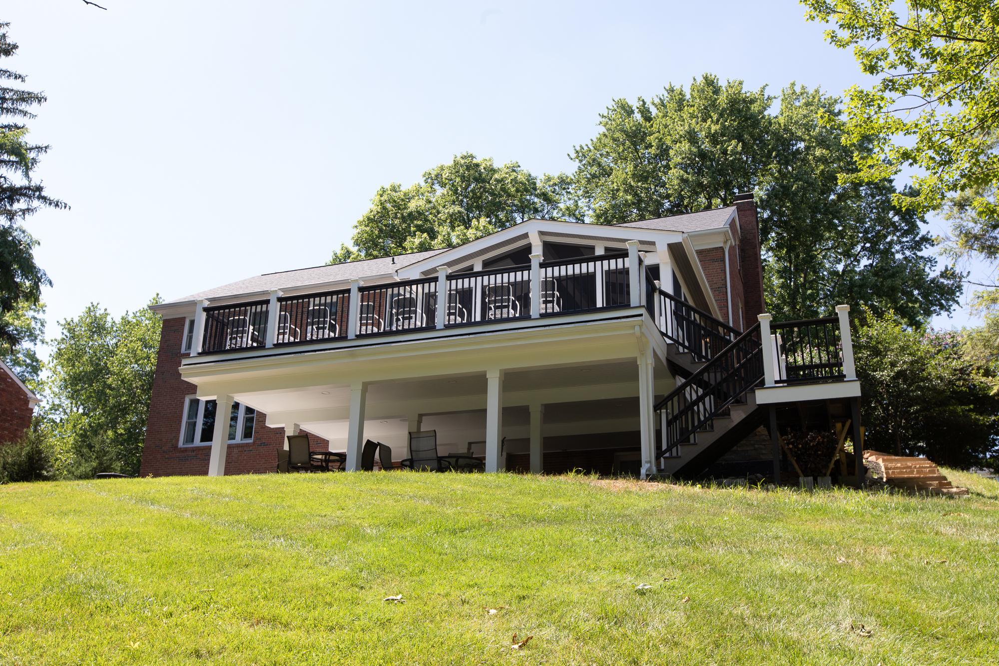 New  deck and screened porch viewed from back yard